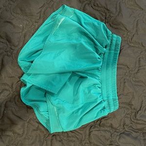Turquoise lululemon hotty hot shorts
